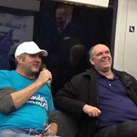 Foto zeigt zwei Bahnreisende