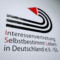 Wandtatoo Logo und Schrift Interessenvertretung Selbstbestimmt Leben in Deutschland e. v. - ISL