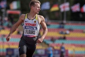 Foto des Weltmeister und Paralympics-Sieger Johannes Floors in Sportkleidung beim Lauf im Stadium