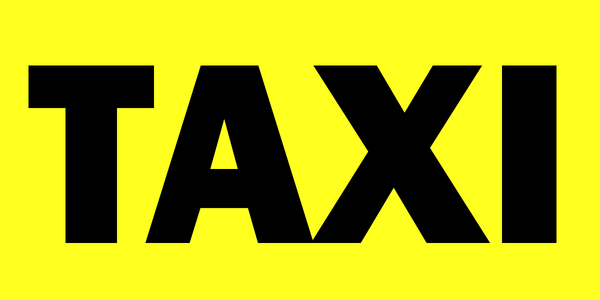 Gelbes Schild mit Text Taxi