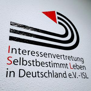 Wandtatoo Logo und Schrift Interessenvertretung Selbstbestimmt Leben in Deutschland e. v. - ISL