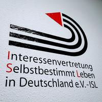 Wandtatoo Logo und Schrift Interessenvertretung Selbstbestimmt Leben in Deutschland e. v. - ISL