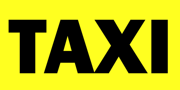 Gelbes Schild mit Text Taxi